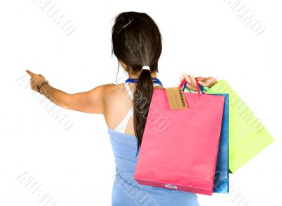 beautiful teenager with shopping bags