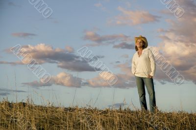Western Woman Against a Cloudy Sky