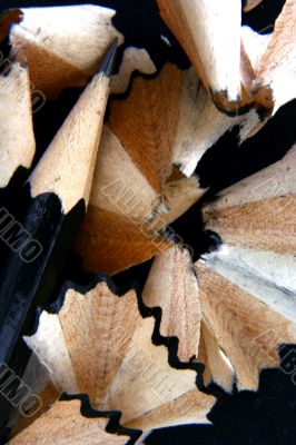 Pencil Shavings isolated in dark background