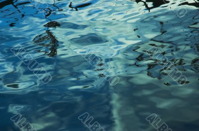 The invoice of a dark blue water ripples