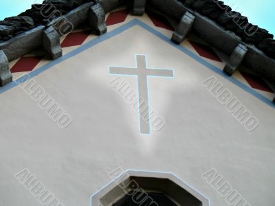 illuminated cross on church