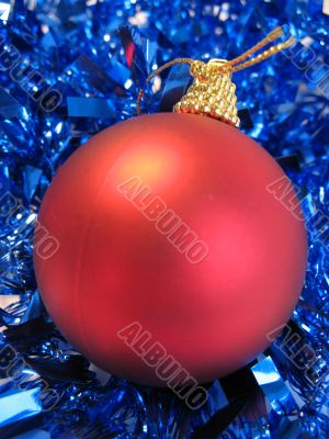 Red christmas balls and blue glare