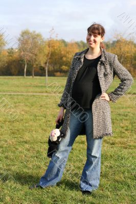 pregnant woman with cat Felix in her hand