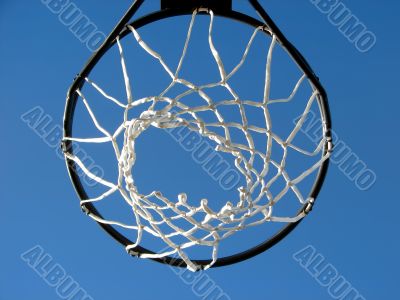New basketball hoop and the blue sky