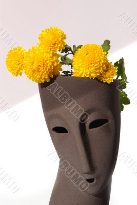 Aroma lamp with yellow flowers