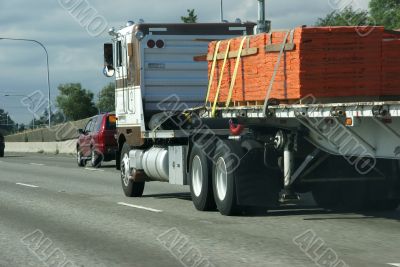 Flatbed semi truck with cargo