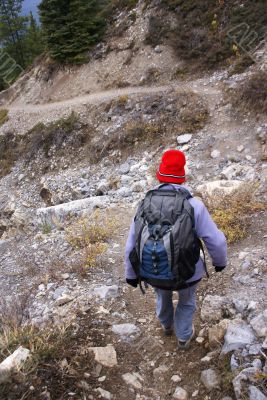Hiker on mountain trail Hiker on mountain trail