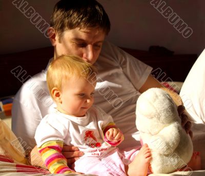 Father play with  daughter