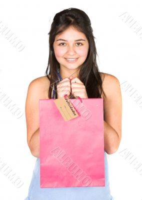 beautiful teenager with shopping bag
