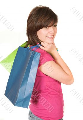 beautiful teenager with shopping bags