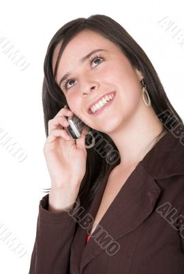beautiful teenager smiling on the phone
