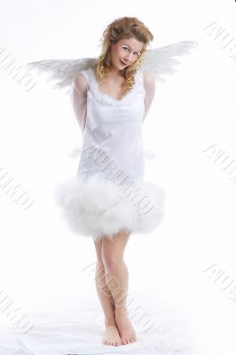 angel standing above the clouds angel standing above the clouds