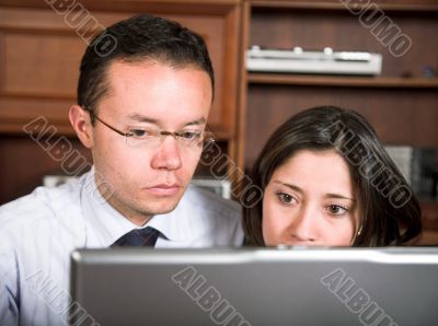 business couple on laptop
