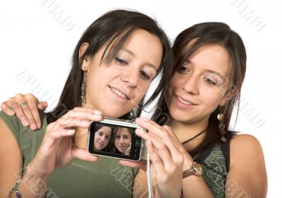 beautiful twins with digital camera
