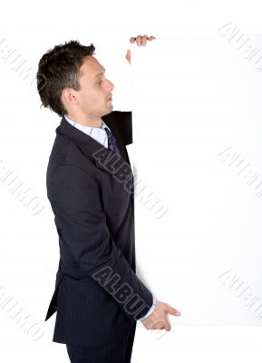 business man holding a white board
