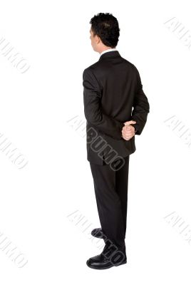 business man from the back - looking at something