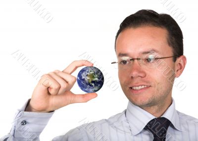 business man holding globe