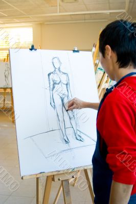 young artist drawing