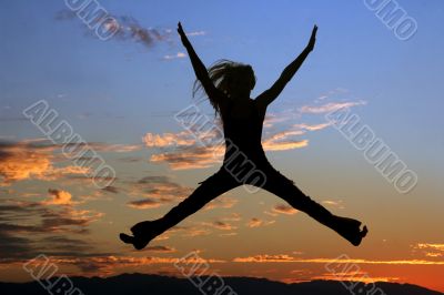 Jumping woman silhouette