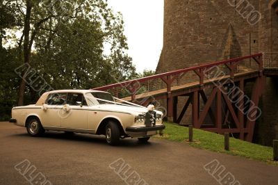 wedding car outside castle