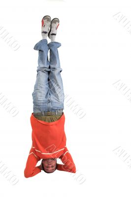 casual guy doing the headstand