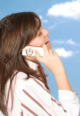 casual girl on the phone outdoors