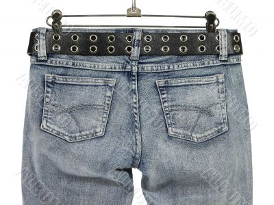 Blue jeans with leather belt