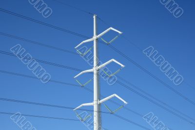White electricity pylon and power lines