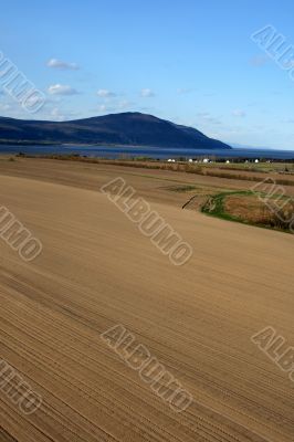 Spacious ploughed land ready for cultivation