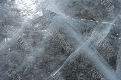 Sun reflecting in the cracked ice surface