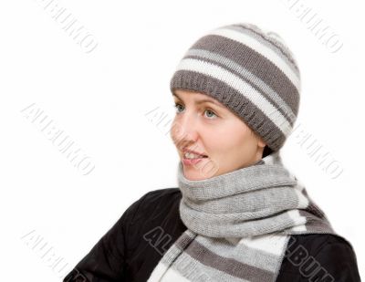 woman wearing a wool scarf and knit hat