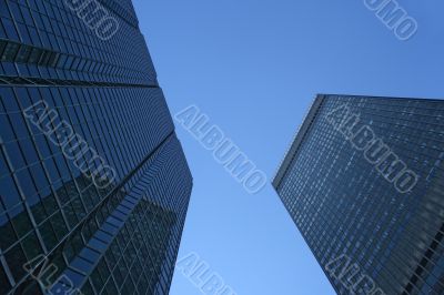Looking up at skyscrapers