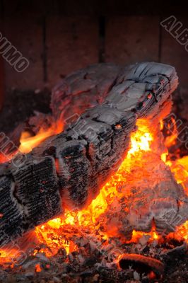 Fireplace - burning wood log and ember