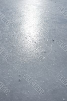 Sun reflection on the surface of an ice rink