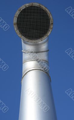 Shiny metallic ventilation pipe with wire mesh