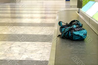 backpack on conveyor