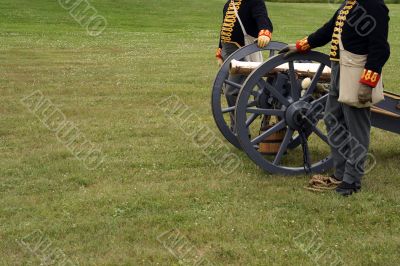 Soldiers in the field with a canon