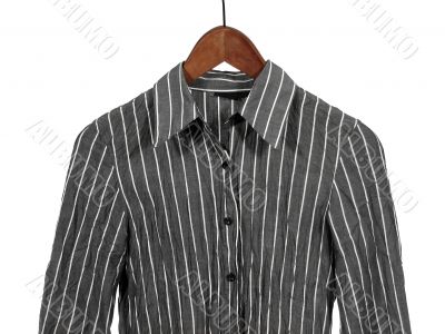 Gray striped shirt on wooden hanger, isolated