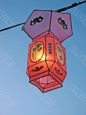 Cozy light of a pink Chinese lantern