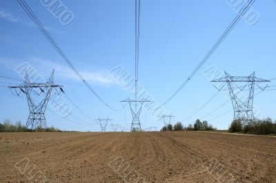 Electricity pylons in cultivated land