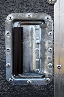 Metallic rivets of a road case