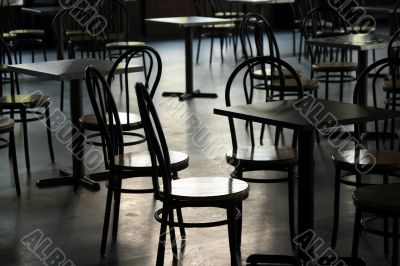 Tables and chairs in a cafeteria