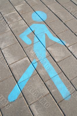 Pedestrian sign on the pavement