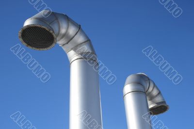 Two metallic industrial pipes