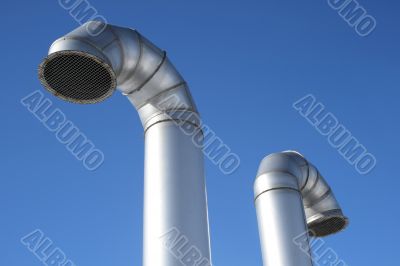 Two metallic industrial pipes Two metallic industrial pipes