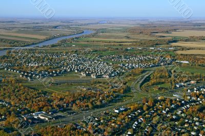 Aerial view of suburban neighborhood near highway