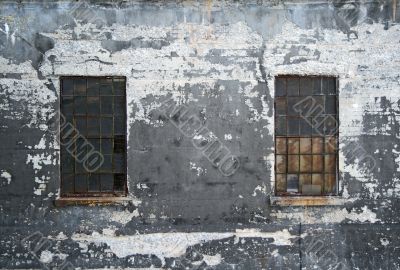 Grungy wall with two windows Grungy wall with two windows