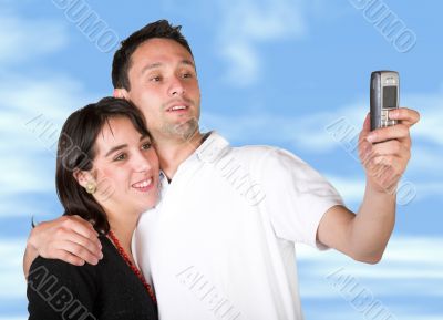 couple taking a pic with cell phone
