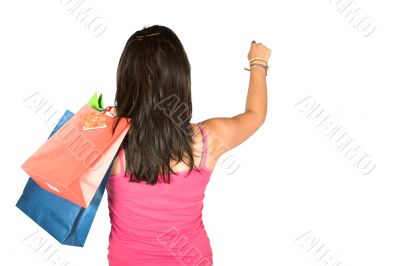 girl with shopping bags reaching for something