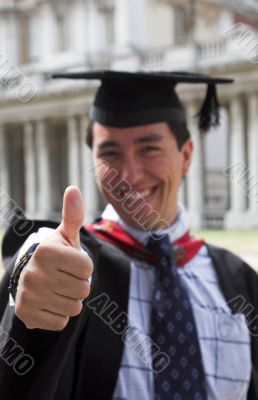 happy graduate - thumbs up